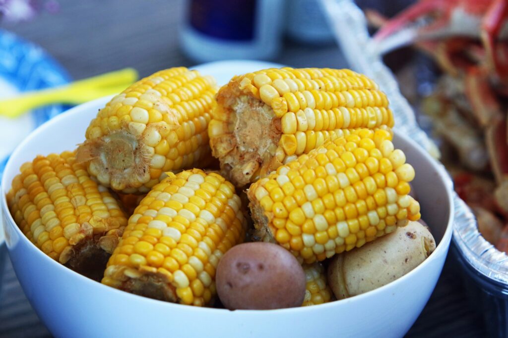 A Practical Guide to Cooking Corn on the Cob in the Microwave with golden corn ears cooked quickly and evenly using a microwave.