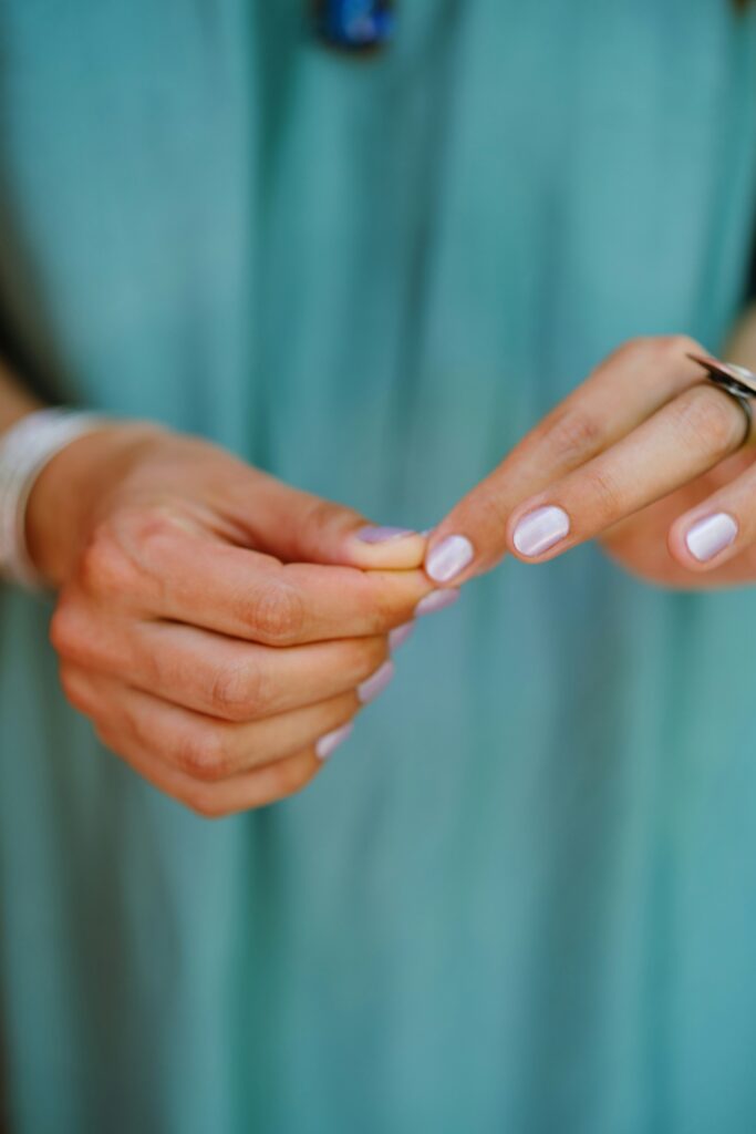 How to Get Nail Glue Out of Clothes guide to glue scraping, solvent treatment, stain removal, detergent, washing methods, and fabric protection.